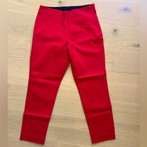 NWOT classic slip fit red cotton stretch pant with side zipper.